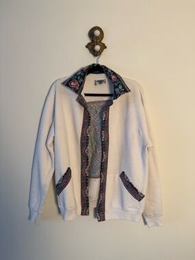Vintage women’s Lee open sweater with floral cut out detail and trim